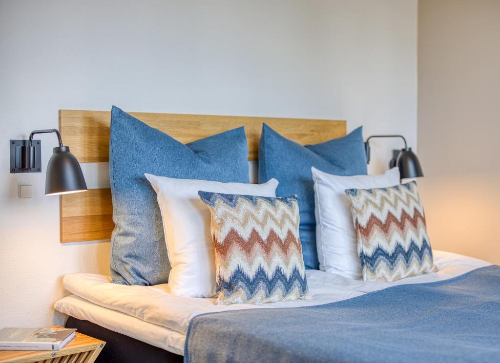 Postel nebo postele na pokoji v ubytování Color Hotel Skagen