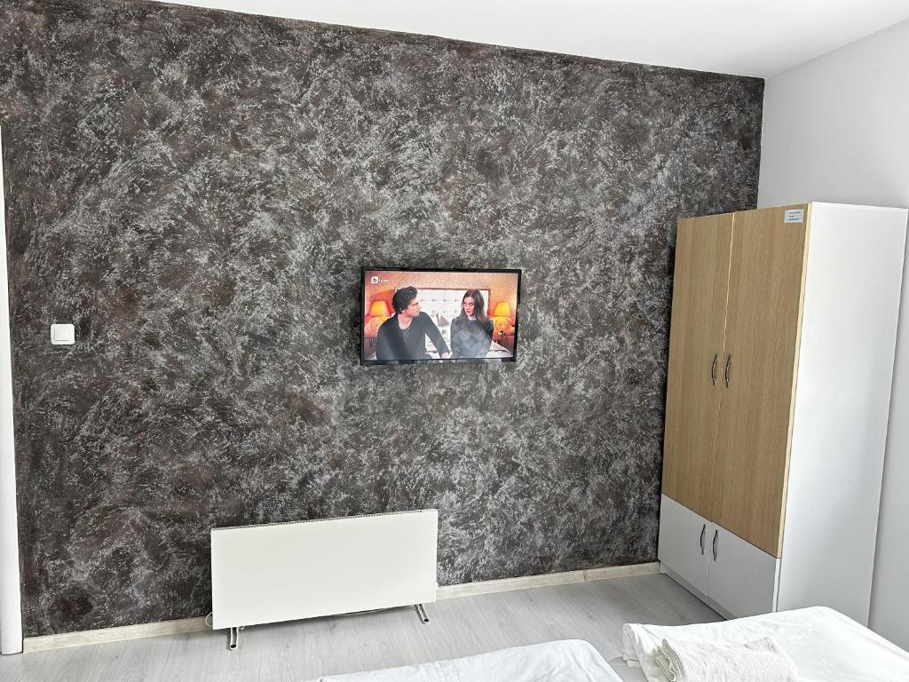 TV a/nebo společenská místnost v ubytování Saint Maria Guest House