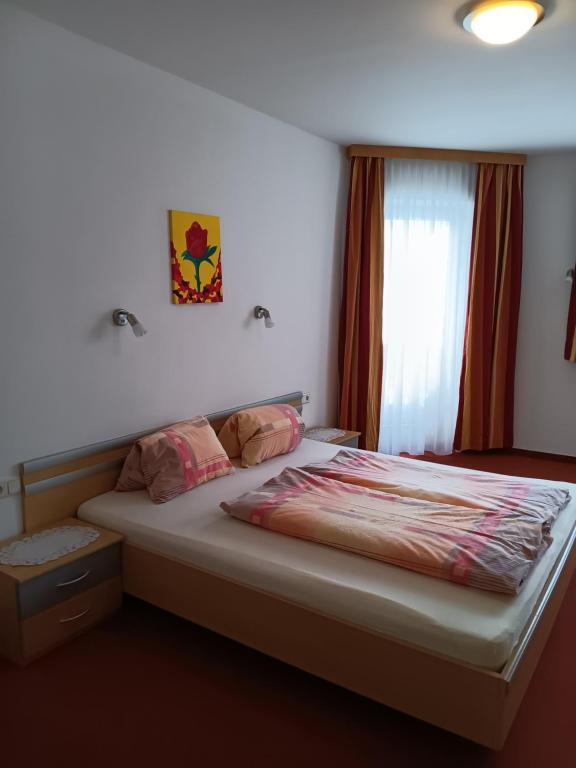 Postel nebo postele na pokoji v ubytování Ranerhof