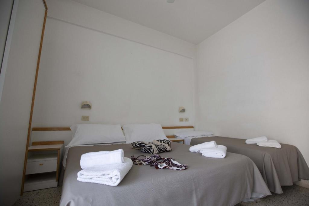 Postel nebo postele na pokoji v ubytování Hotel Eden B&B