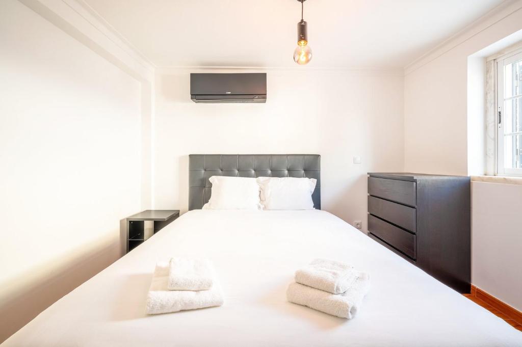 GuestReady - Pleasant stay in Encarnação tesisinde bir odada yatak veya yataklar