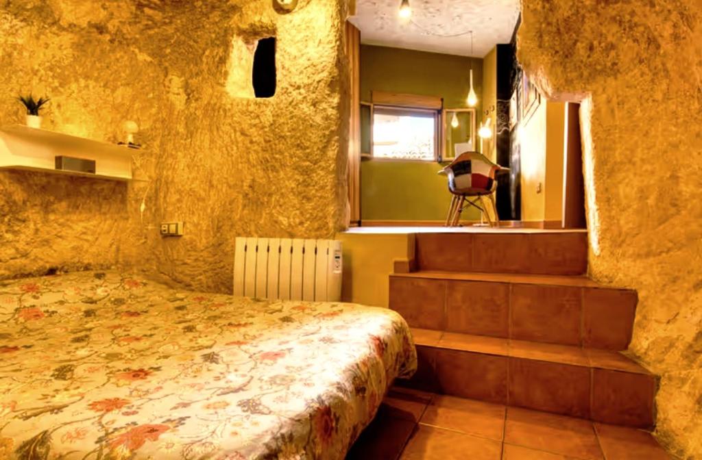 A bed or beds in a room at monmossen bocairent