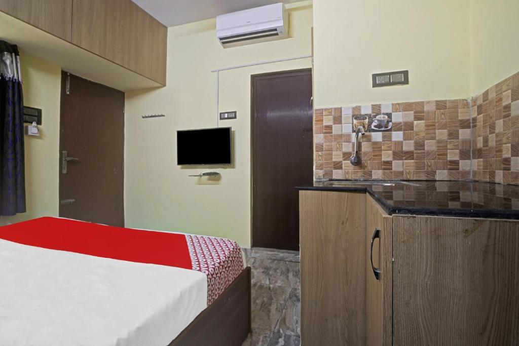 TV a/nebo společenská místnost v ubytování Hotel O T.Nagar