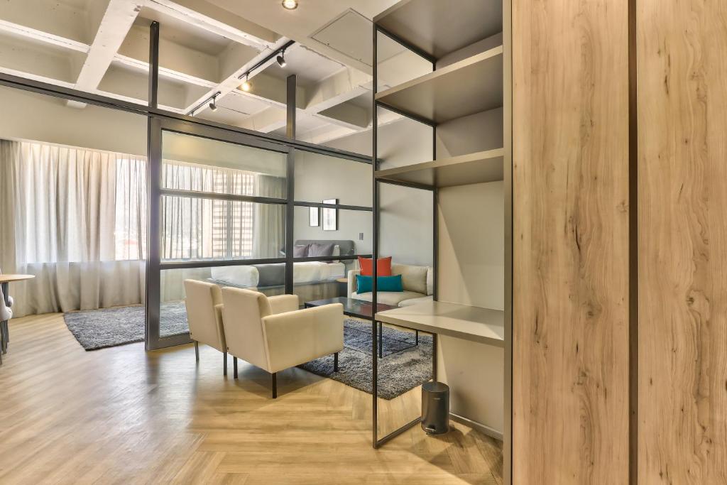 Posezení v ubytování WINK Aparthotel One Thibault