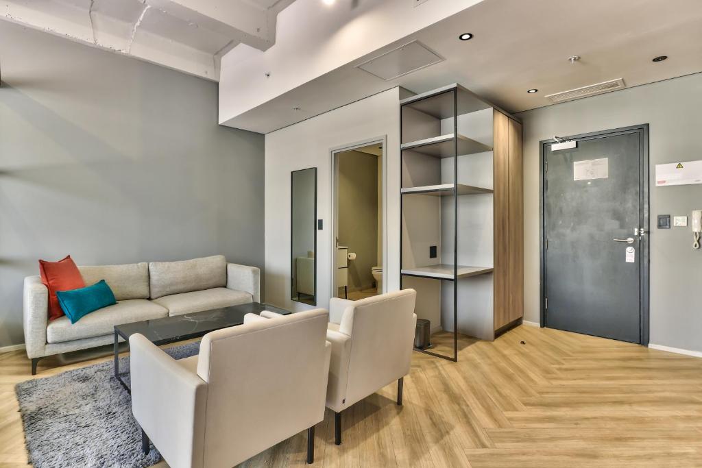 Posezení v ubytování WINK Aparthotel One Thibault
