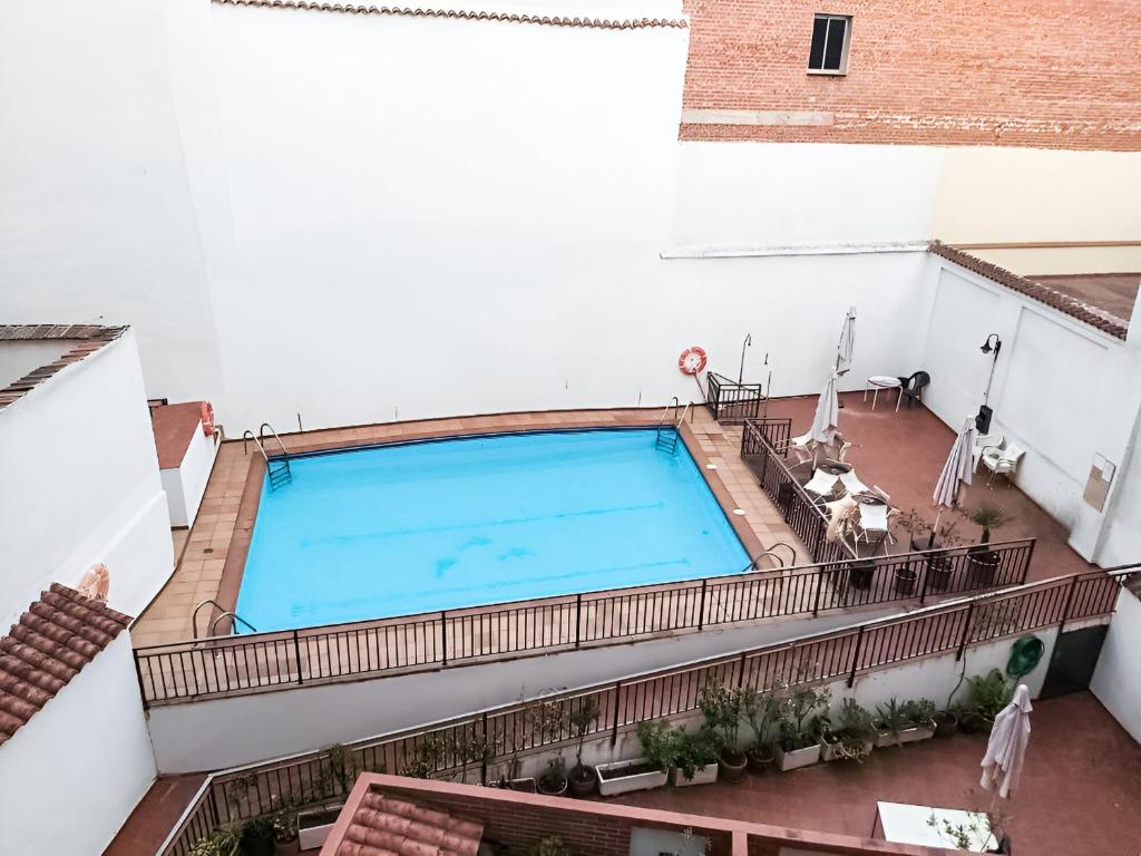 an overhead view of a swimming pool on a building at Plaza Mayor II - Apartamento de 2 dormitorios in Madrid