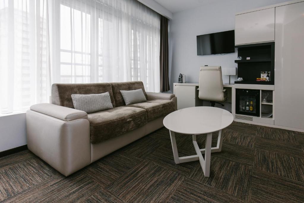 TV a/nebo společenská místnost v ubytování Hotel Heritage