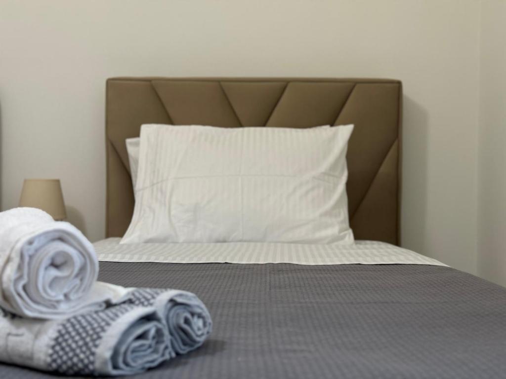 Postel nebo postele na pokoji v ubytování Angelo Agapi Rooms Vlore