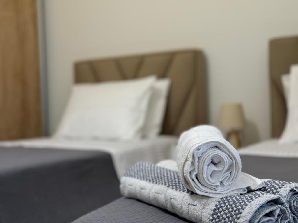 Postel nebo postele na pokoji v ubytování Angelo Agapi Rooms Vlore