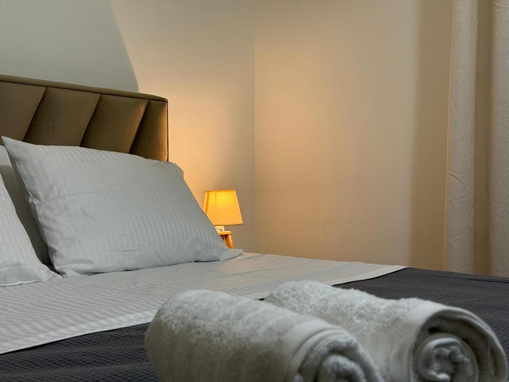 Postel nebo postele na pokoji v ubytování Angelo Agapi Rooms Vlore
