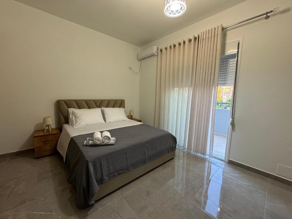 Postel nebo postele na pokoji v ubytování Angelo Agapi Rooms Vlore