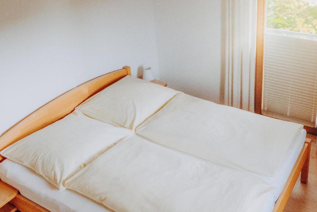 Postel nebo postele na pokoji v ubytování Lindenhaus