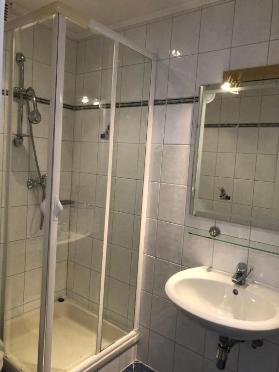 Koupelna v ubytování Hotel Weismann