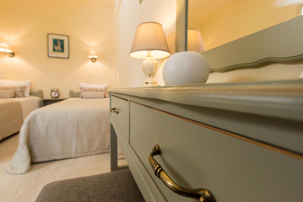 Postel nebo postele na pokoji v ubytování Agrimia Holiday Apartments
