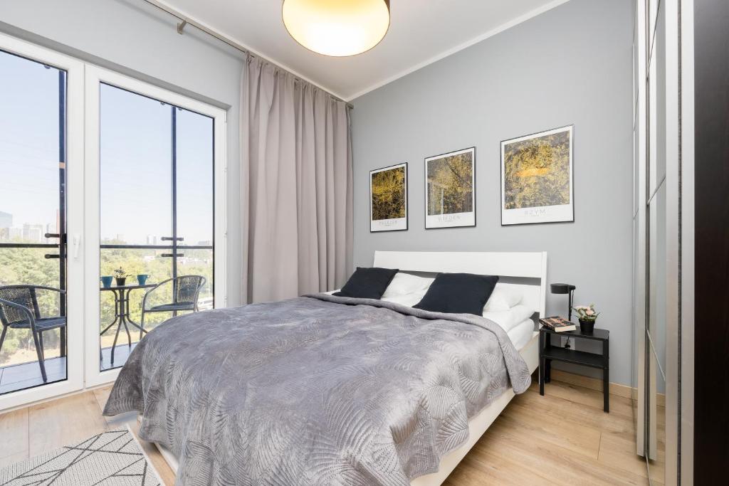 Posteľ alebo postele v izbe v ubytovaní Warsaw Prymasa Tysiąclecia Business Centre by Noclegi Renters