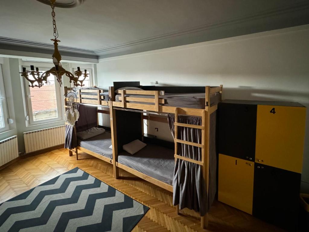 Postel nebo postele na pokoji v ubytování Nomad Hostel