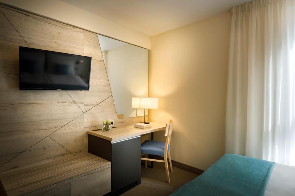 TV a/nebo společenská místnost v ubytování Hotel Marina - Liburnia