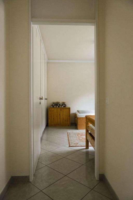 Postel nebo postele na pokoji v ubytování Residenza Porto Fino App 7000