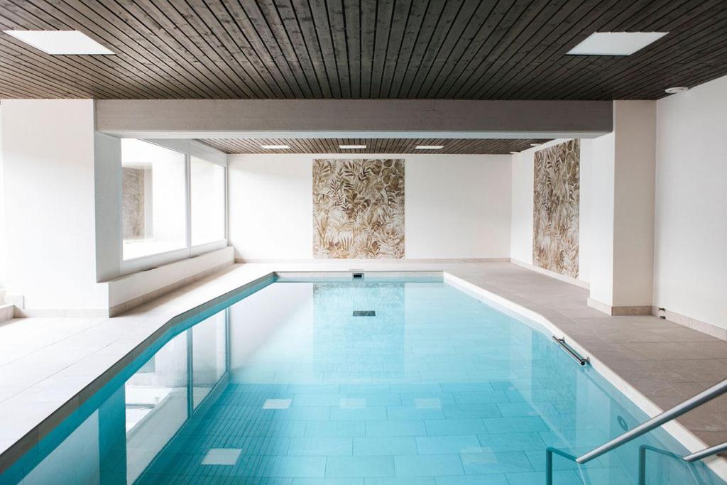 Bazén v ubytování Residenza Porto Fino App 7000 nebo v jeho okolí