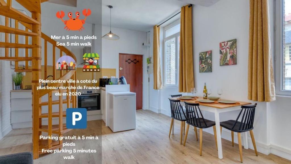 - une cuisine et une salle à manger avec une table et des chaises dans l'établissement L'OCTOPUS/Entièrement rénové, à Dieppe