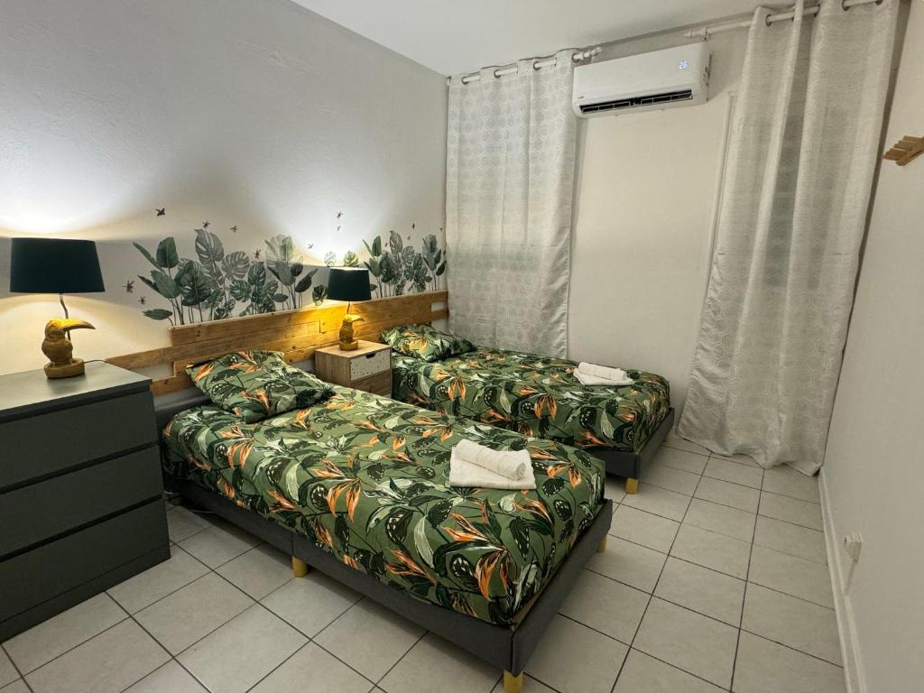 Voodi või voodid majutusasutuse Villa 4 ch 140 m2 avec vue sur mer et le tombolo toas