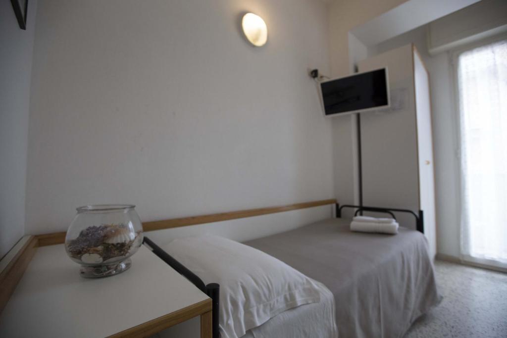 Postel nebo postele na pokoji v ubytování Hotel Eden B&B