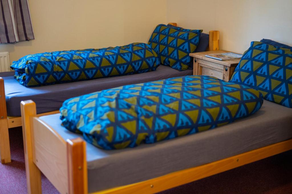 Postel nebo postele na pokoji v ubytování Aviemore Youth Hostel