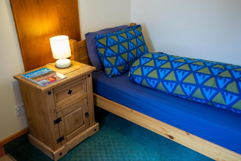 Postel nebo postele na pokoji v ubytování Aviemore Youth Hostel