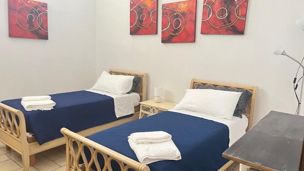 Posteľ alebo postele v izbe v ubytovaní Villa Daniela - Appartamento in villa