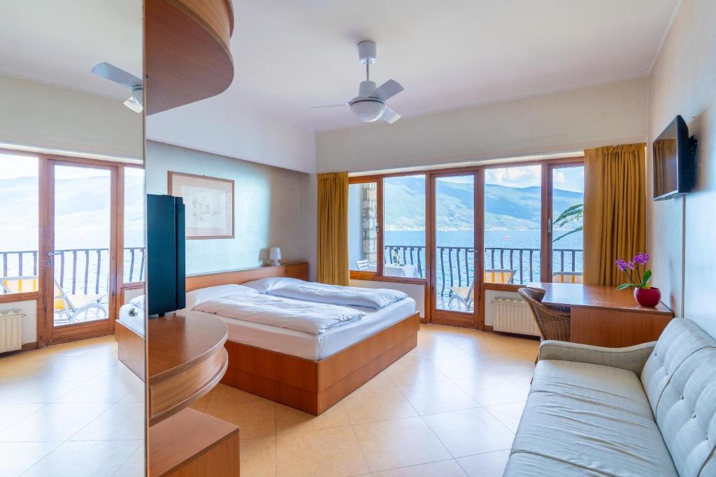 Postel nebo postele na pokoji v ubytování Hotel Forbisicle