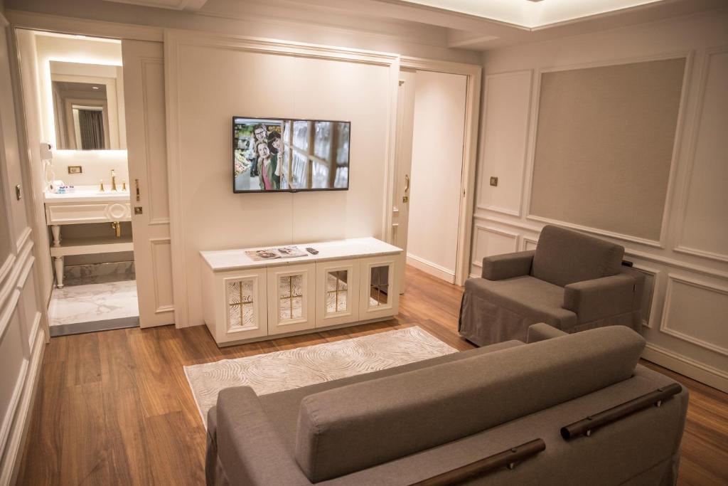 TV a/nebo společenská místnost v ubytování Mina Hotel - Special Category
