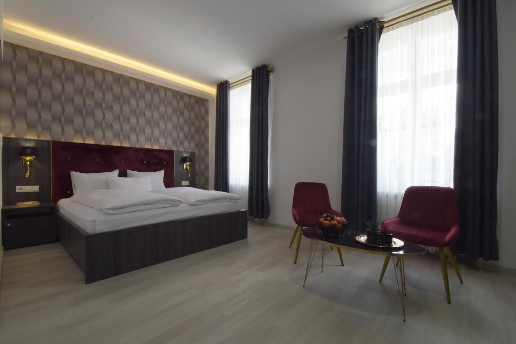 Postel nebo postele na pokoji v ubytování Hotel Grand Inn Berlin - Weißensee