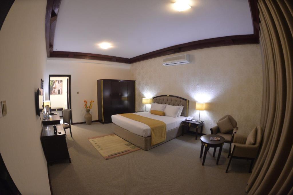 Postel nebo postele na pokoji v ubytování Verona Resorts Sharjah