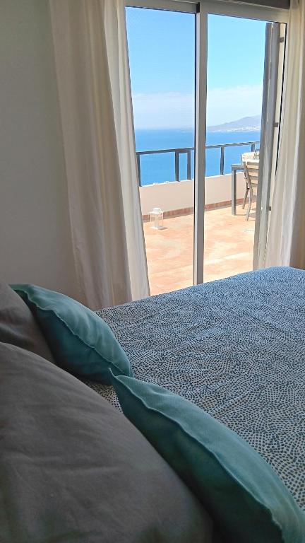 Posteľ alebo postele v izbe v ubytovaní Maravillosas vistas al Atlántico