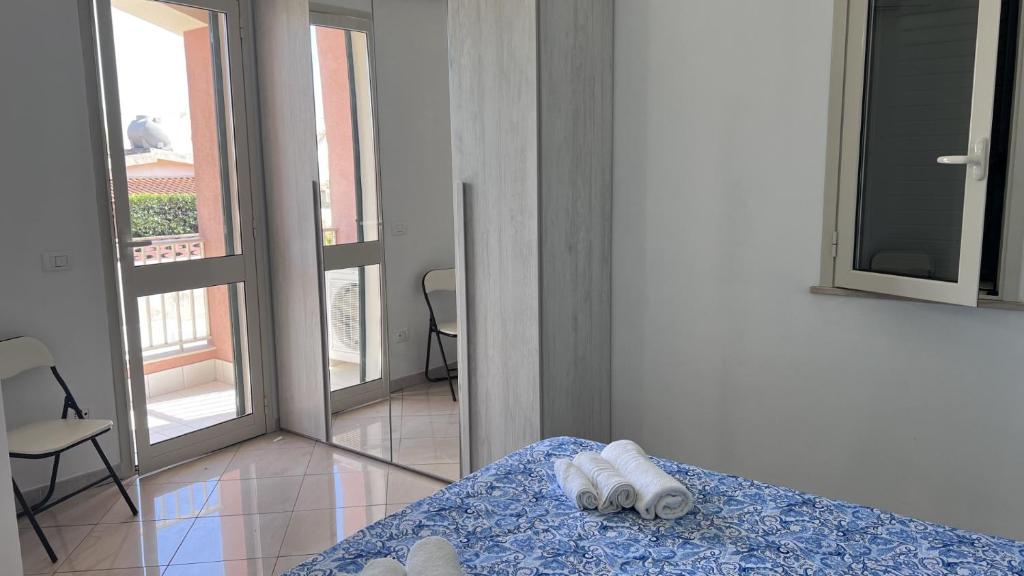 Postel nebo postele na pokoji v ubytování Holiday House Villa AleGiù Marzamemi