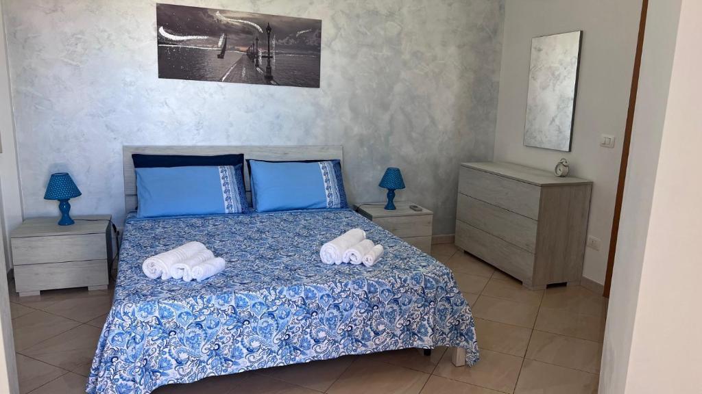 Postel nebo postele na pokoji v ubytování Holiday House Villa AleGiù Marzamemi