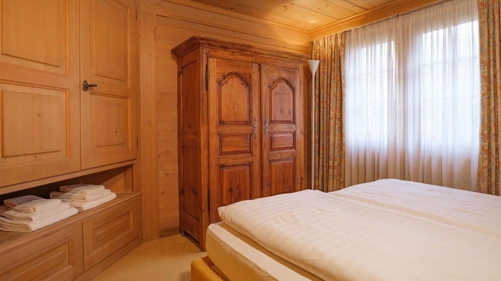 Postel nebo postele na pokoji v ubytování Chalet Kisseye by Zermatt Premium Apartments