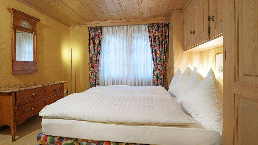 Postel nebo postele na pokoji v ubytování Chalet Kisseye by Zermatt Premium Apartments