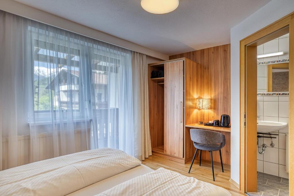 Postel nebo postele na pokoji v ubytování Apart Winkler
