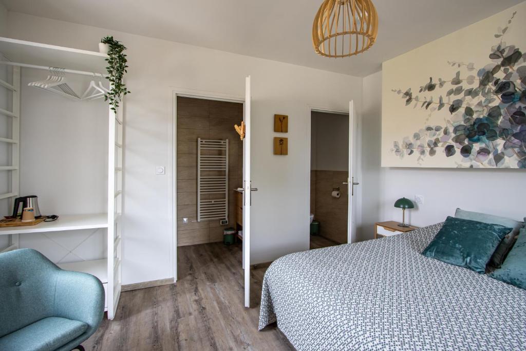 Postel nebo postele na pokoji v ubytování Auberge du Molveau