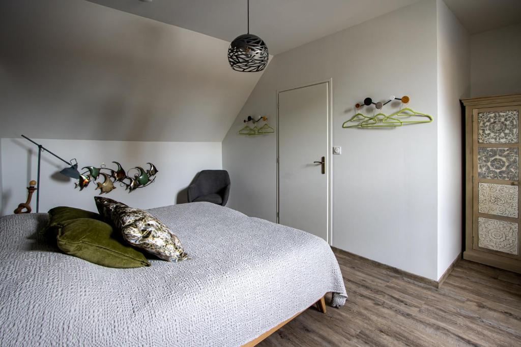 Postel nebo postele na pokoji v ubytování Auberge du Molveau