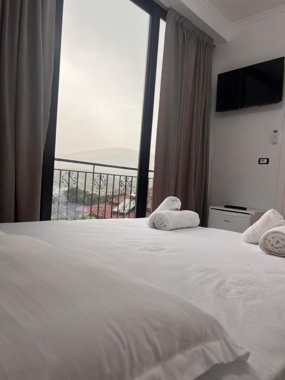 Postel nebo postele na pokoji v ubytování Hotel Villa Edis