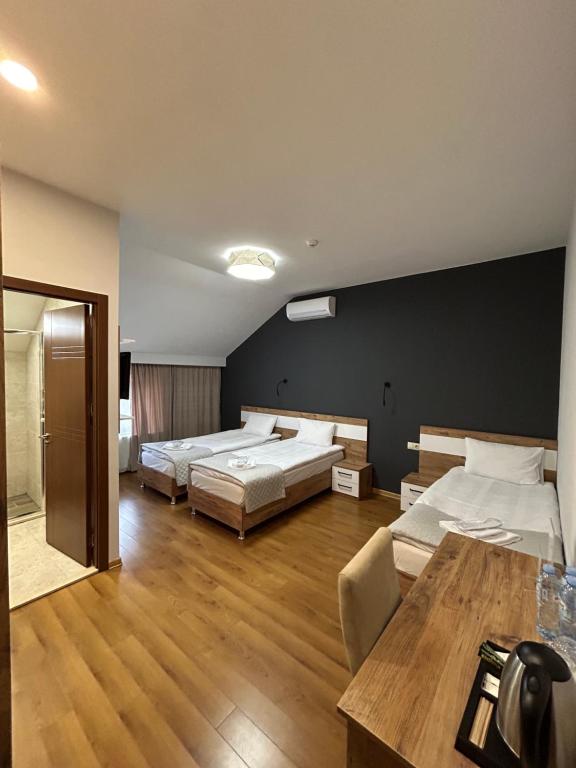 Postel nebo postele na pokoji v ubytování 10 KEYS Boutique Hotel