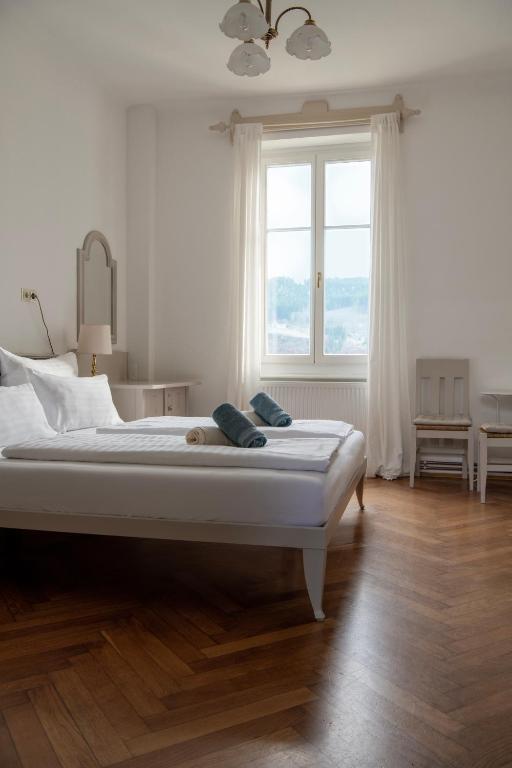 Postel nebo postele na pokoji v ubytování Villa Streintz