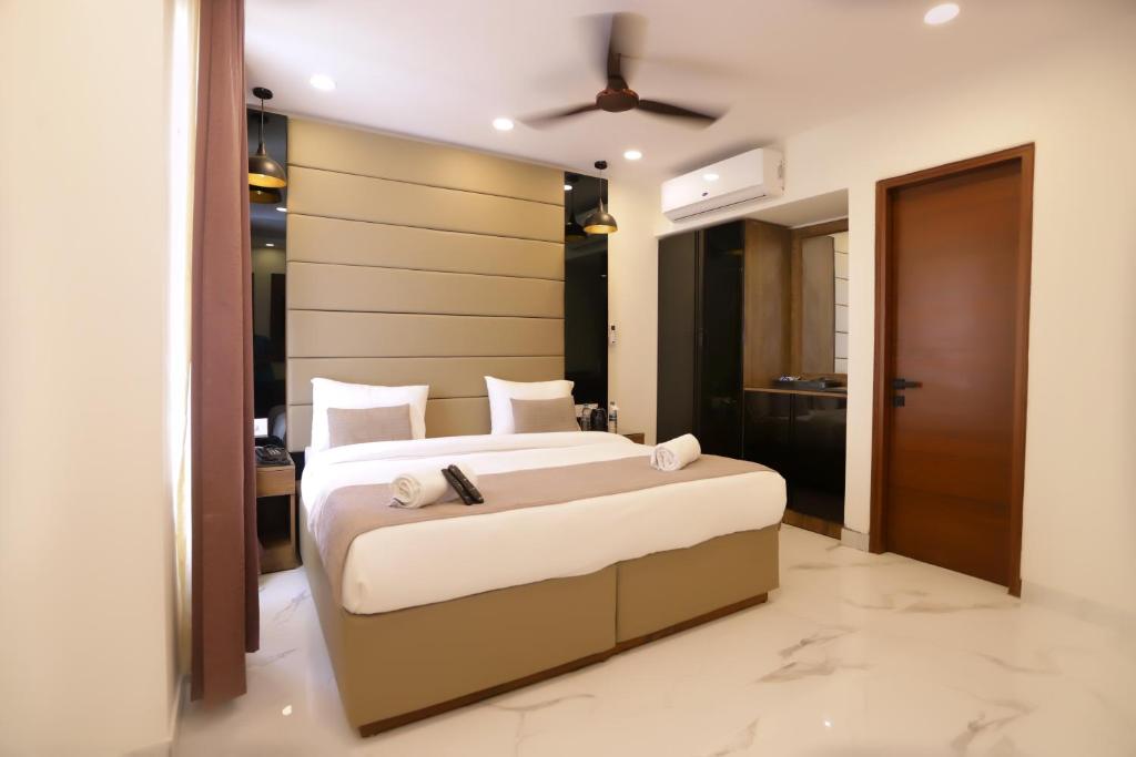 Postel nebo postele na pokoji v ubytování PK Boutique Hotel