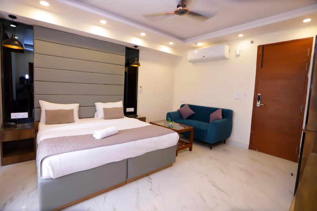 Postel nebo postele na pokoji v ubytování PK Boutique Hotel
