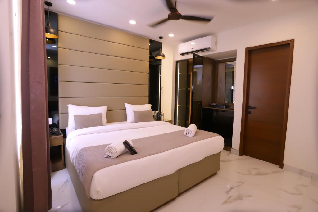 Postel nebo postele na pokoji v ubytování PK Boutique Hotel