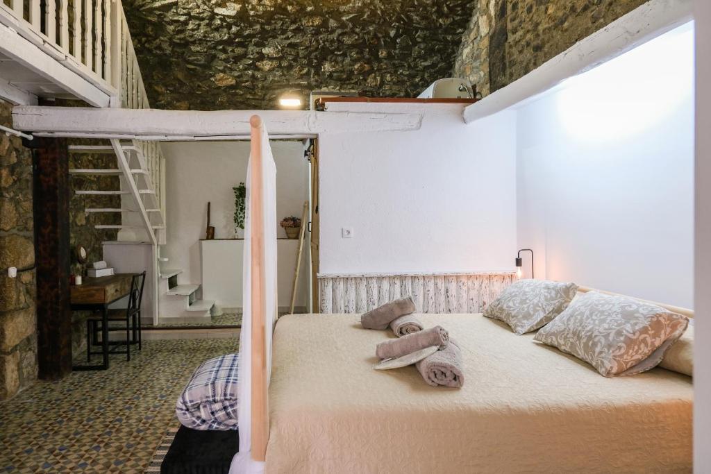 Postel nebo postele na pokoji v ubytování Alojamiento Rural Can Picas