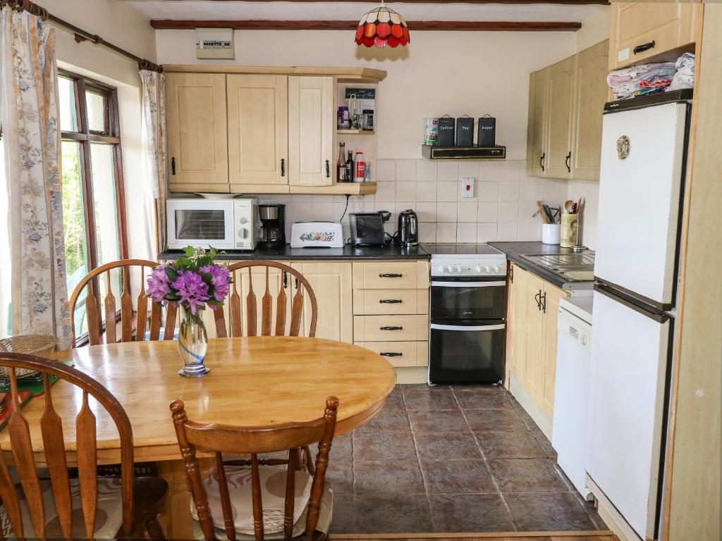 Kuchyň nebo kuchyňský kout v ubytování Hideaway