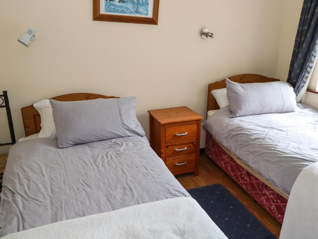 Postel nebo postele na pokoji v ubytování Hideaway